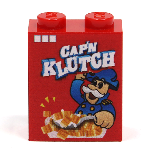 Red LEGO brick featuring a custom printed Cap'N Klutch Cereal design with a cartoon captain mascot and cereal bowl, from Cap'N Klutch Cereal (1 x 2 x 2 Brick) made using LEGO parts - B3 Customs.