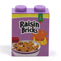 Purple LEGO brick featuring custom printed "Raisin Bricks" cereal box design with a bowl of raisin cereal and an animated sun on the side, Raisin Bricks Cereal 1x2x2 Brick on real LEGO part - B3 Customs.