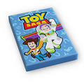 Rectangular blue custom printed tile featuring Toy Saga Movie Cover (2x3 Tile) with animated characters resembling a cowboy and a space ranger against a playful patterned background.