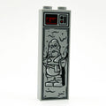 Gray LEGO brick featuring a detailed black and red printed design of a Blue Trader figure frozen in carbonite, styled as Blue Trader in Carbonite (1x2x5 Brick).