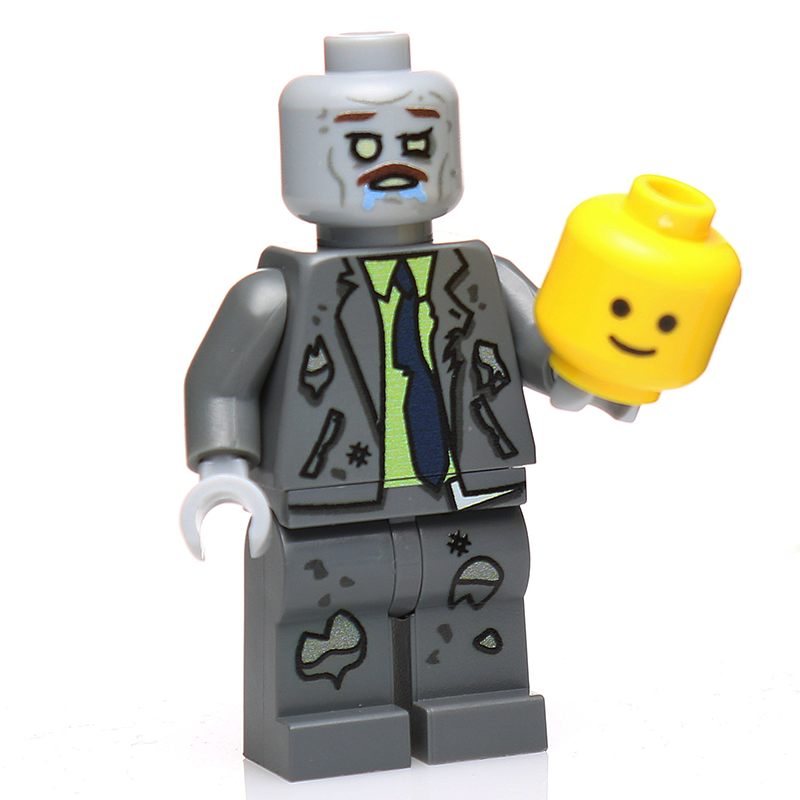 Custom LEGO zombie minifigure from B3 Customs holding a yellow minifigure head, part of the Fresh Brains Zombie Vending Machine w/ Zombie Minifig set, featuring detailed zombie printing.