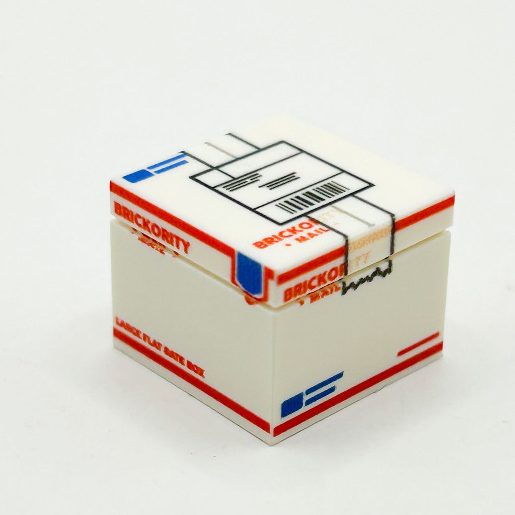 A detailed USPS Priority Shipping Box - Custom Printed made using LEGO parts featuring authentic custom printed tiles by B3 Customs with red and blue postal design accents.