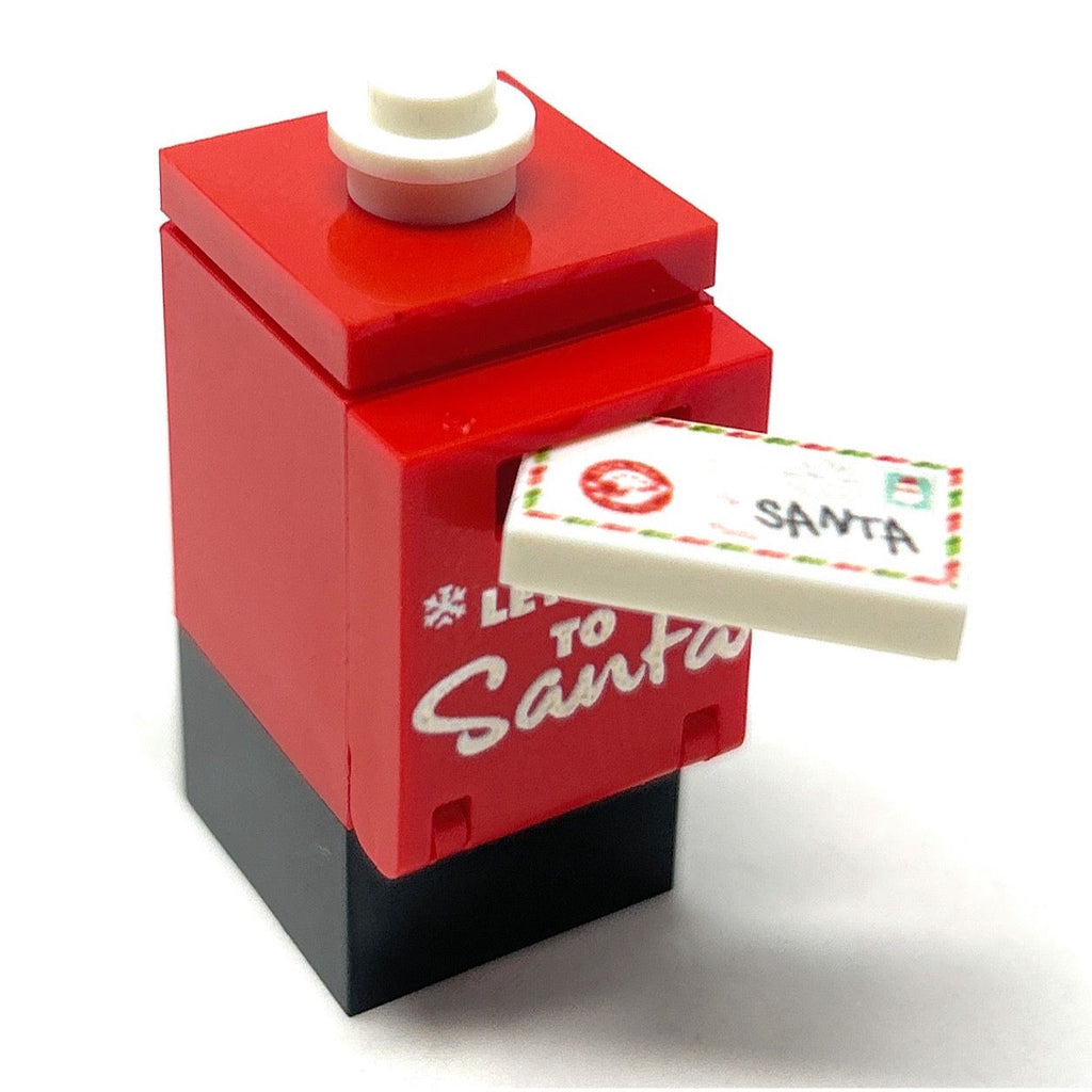 Letter to Santa Mailbox and Envelope made using LEGO parts - B3 Customs features a red and black LEGO mailbox with a white envelope stamped for Santa, crafted by B3 Customs.