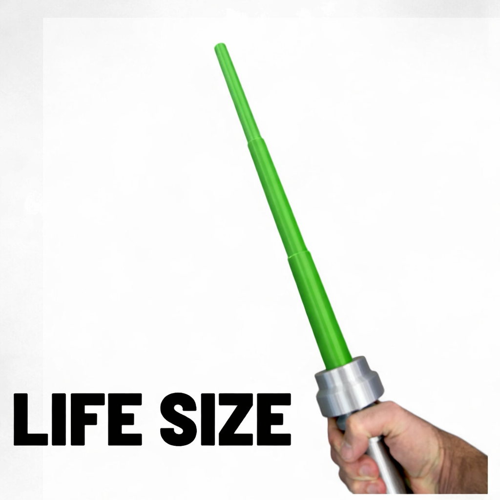 Hand holding a Life-Size Brick Blade with Retractable Green Blade / Cosplay by B3 Customs, featuring a green extendable blade and silver hilt designed for cosplay enthusiasts.