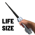 Hand gripping a silver handle of the Life-Size Dark Brick Blade with Retractable Black Blade / Cosplay by B3 Customs, featuring a sleek black retractable blade against a white background.