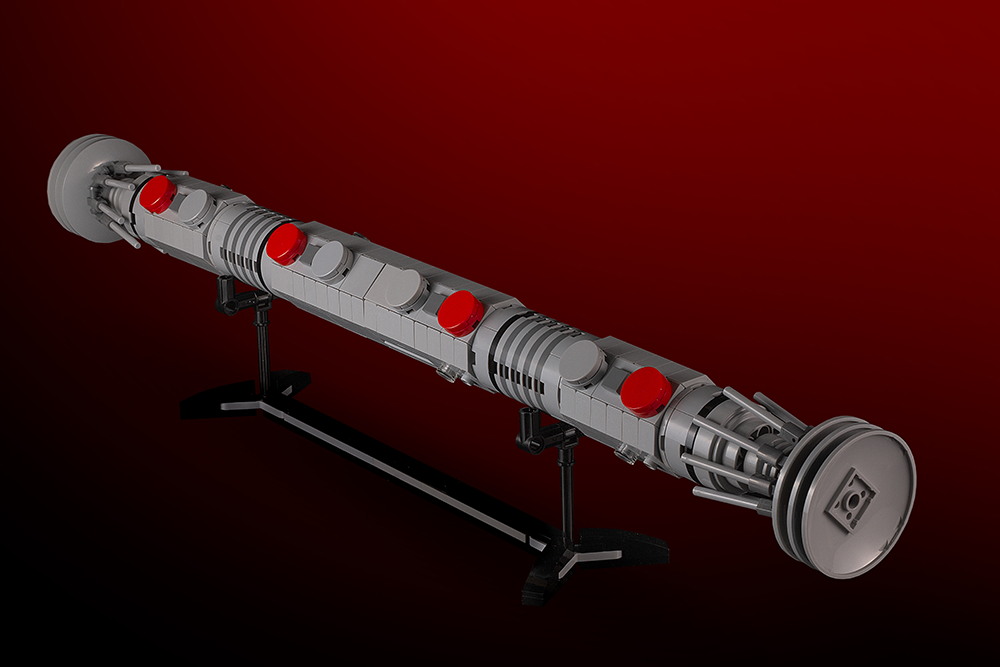 Maul Saber w/ Stand - Custom MOC made with LEGO bricks displayed on a black stand against a red background, showcasing intricate LEGO brick detailing by B3 Customs.