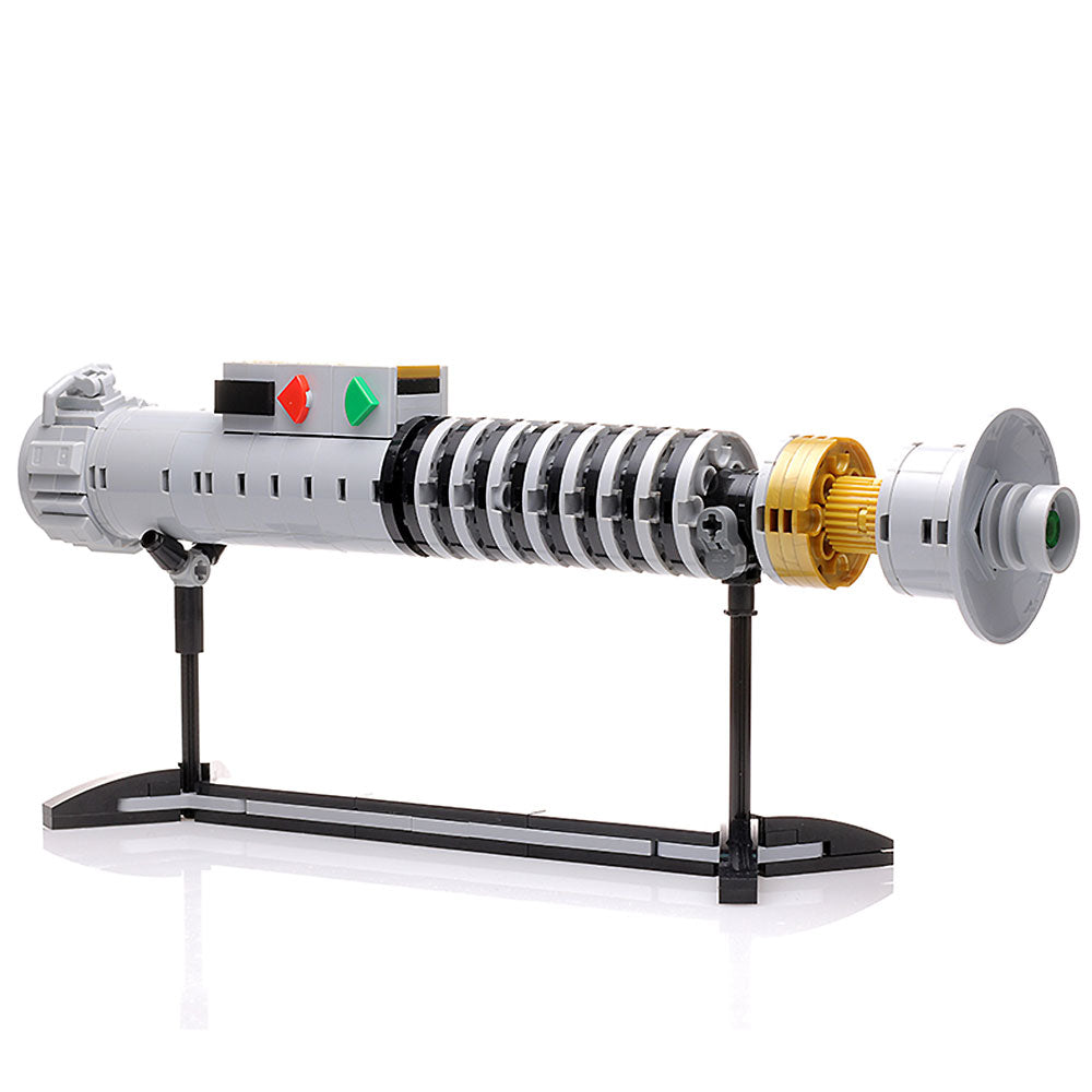 Luke Skywalker ROTJ Lightsaber w/ Stand - Custom MOC made with LEGO bricks by B3 Customs, featuring detailed gray and gold elements displayed on a sleek black stand.