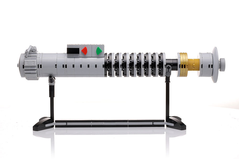 Luke Skywalker ROTJ Lightsaber w/ Stand - Custom MOC made with LEGO bricks by B3 Customs, detailed replica featuring authentic design and display stand in gray and gold tones.