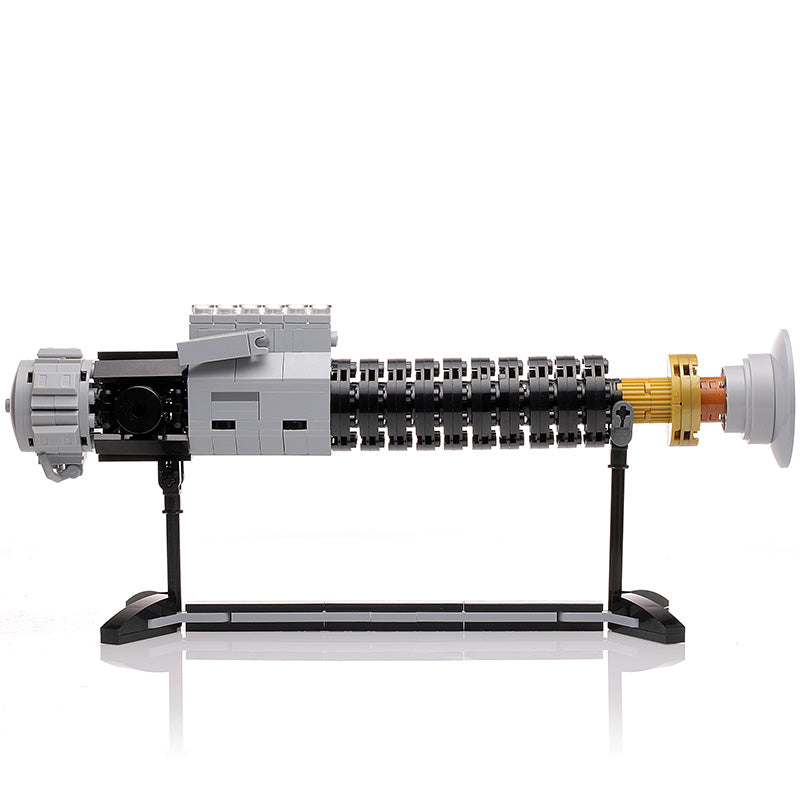 Obi-Wan Lightsaber w/ Stand made with LEGO parts, featuring intricate black and gray LEGO construction with golden accents, displayed on a sleek supportive stand.