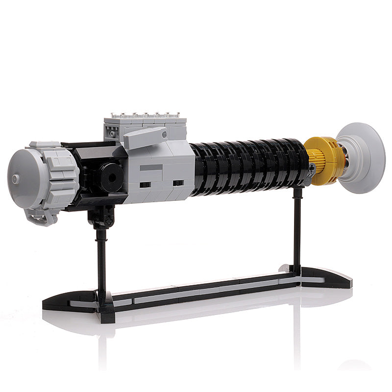 Obi-Wan Lightsaber w/ Stand made with LEGO parts, featuring detailed black and gray LEGO bricks with a yellow accent, displayed on a sleek black stand.