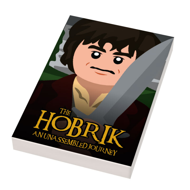 Hobbrick Movie Cover (2x3 Tile) made using LEGO parts - B3 Customs features a custom LEGO tile depicting a stylized hobbit character holding a sword with the title "The Hobrik: An Unassembled Journey" in bold letters.