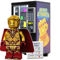 Infinity Stones Vending Machine w/ Official LEGO Adam Warlock Minifigure by B3 Customs features a detailed LEGO vending machine with colorful stones and a gold and red minifigure with cape.
