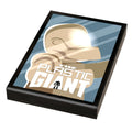 Framed custom printed tile featuring stylized artwork of a giant robot with glowing eyes and text "The Plastic Giant," showcasing the Plastic Giant Movie Cover (2x3 Tile) - B3 Customs.