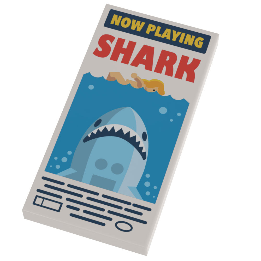 Shark Now Playing Movie Poster (2x4 Tile) - B3 Customs showing a custom lego movie poster tile with a shark emerging from water below a swimmer, featuring bold red and yellow text.