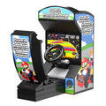 Miniature LEGO arcade cabinet styled for a kart racing game with steering wheel and colorful game screen, featuring "Super Brickio Kart Arcade Racing Game" design by B3 Customs.