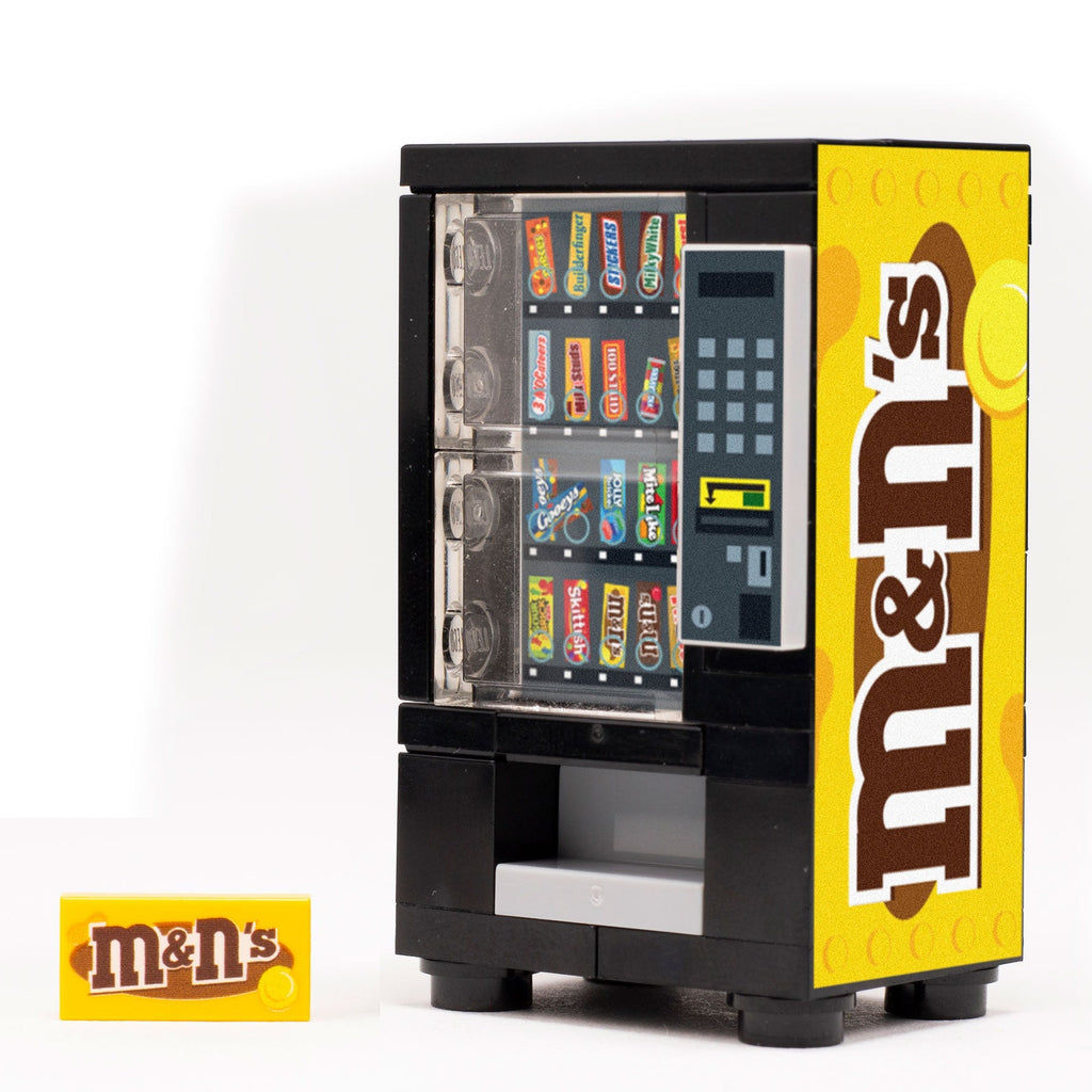M&Ns (Peanut) Candy Vending Machine made using LEGO parts - B3 Customs features a detailed miniature LEGO vending machine with M&M's branding and realistic candy selections.
